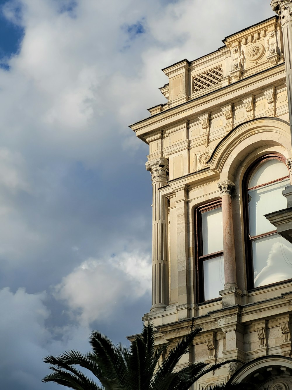 a tall building with a clock on the front of it