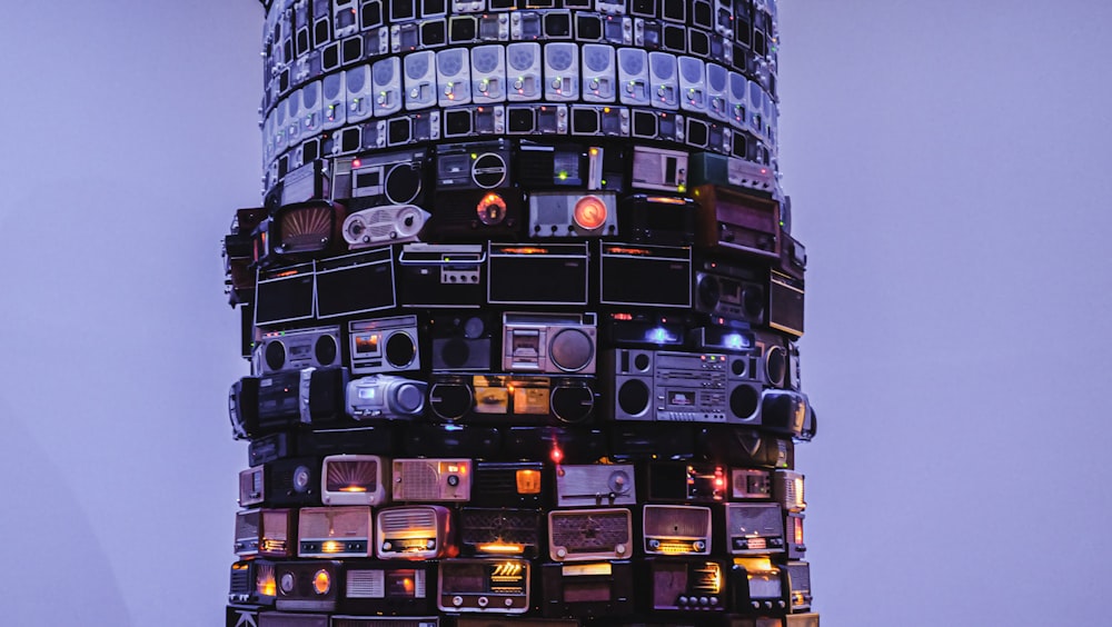 a very tall tower with many electronic devices on it