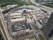 Aerial view of a mixed-use development project showcasing residential and commercial spaces.