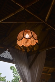 a lamp hanging from the ceiling of a room