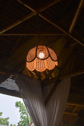 a lamp hanging from the ceiling of a room