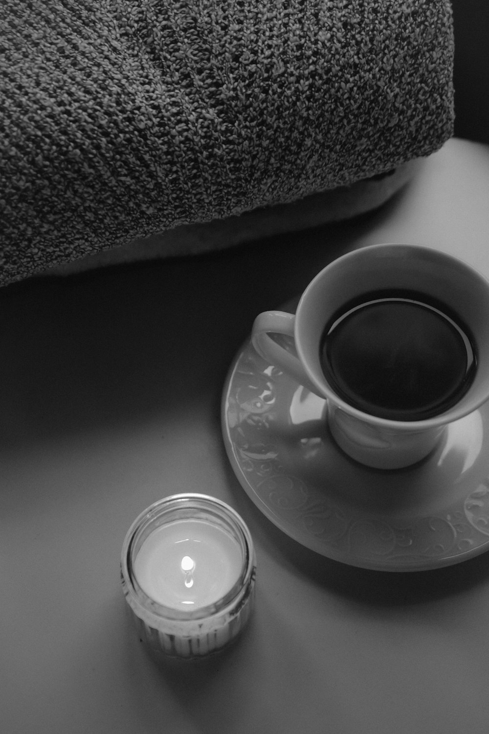 a cup of coffee sitting on top of a saucer