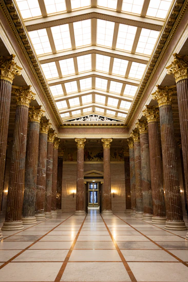 a large building with columns and a skylight