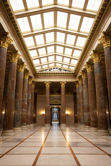 a large building with columns and a skylight