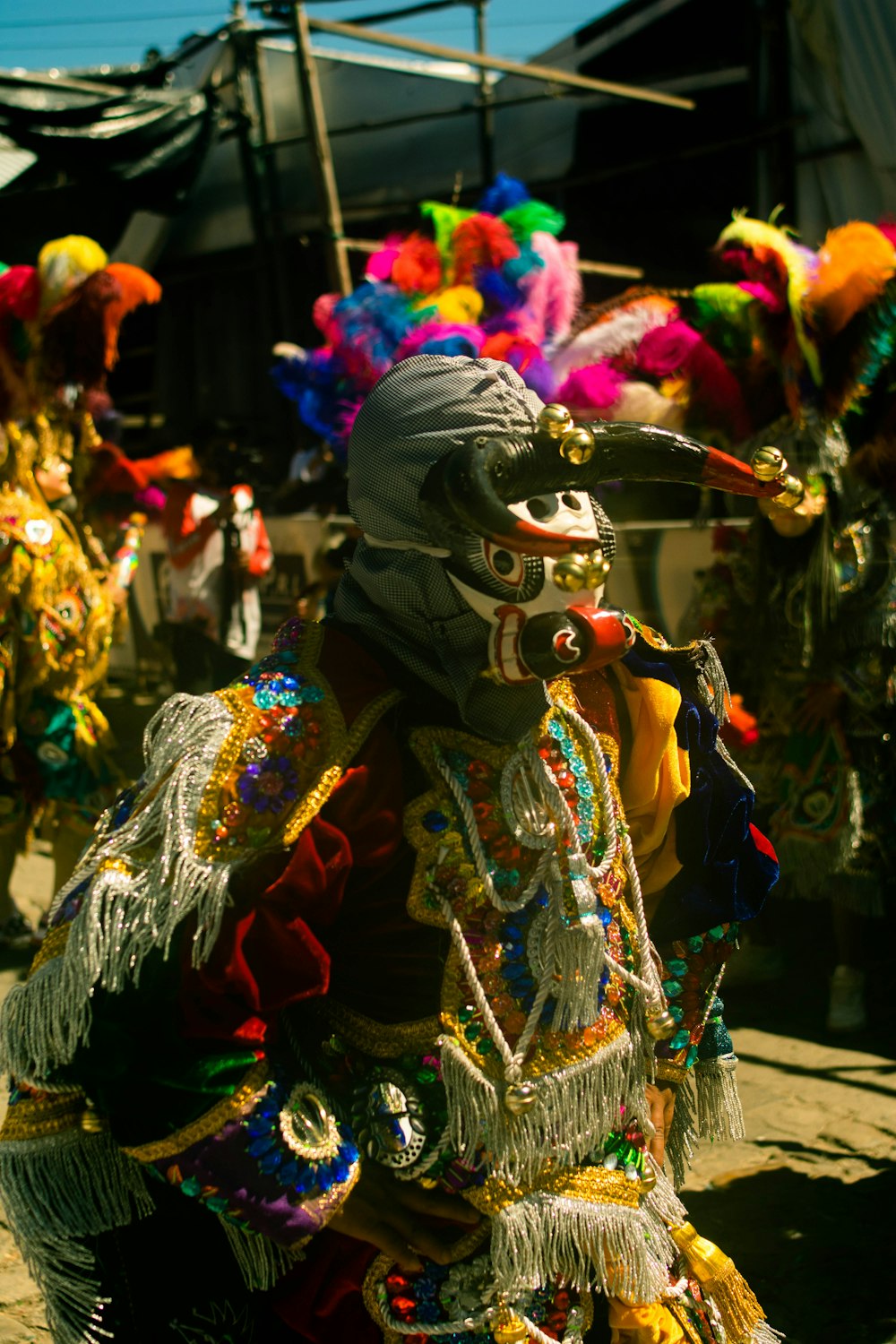 a group of people dressed in colorful costumes