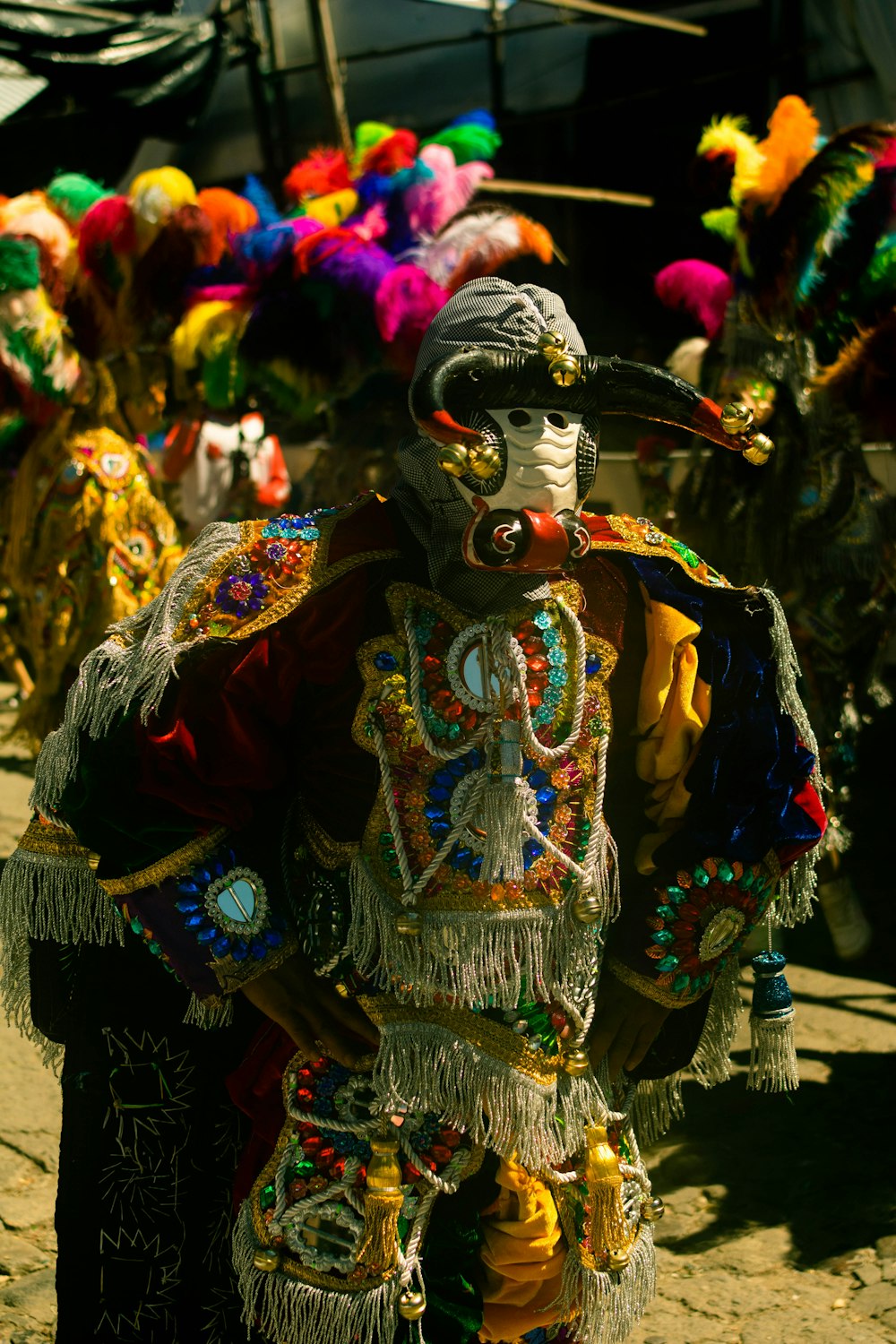 a group of people dressed in colorful costumes