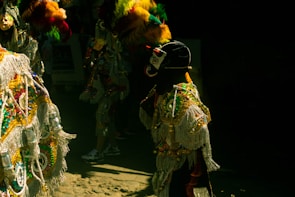 Close-up of colorful costumes worn by festival participants during a cultural dance.