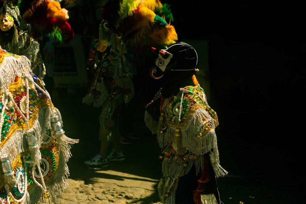 a group of people dressed up in costumes