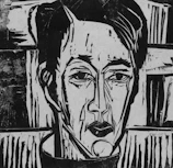 Black and white figurative print with striking contrast and raw emotion.