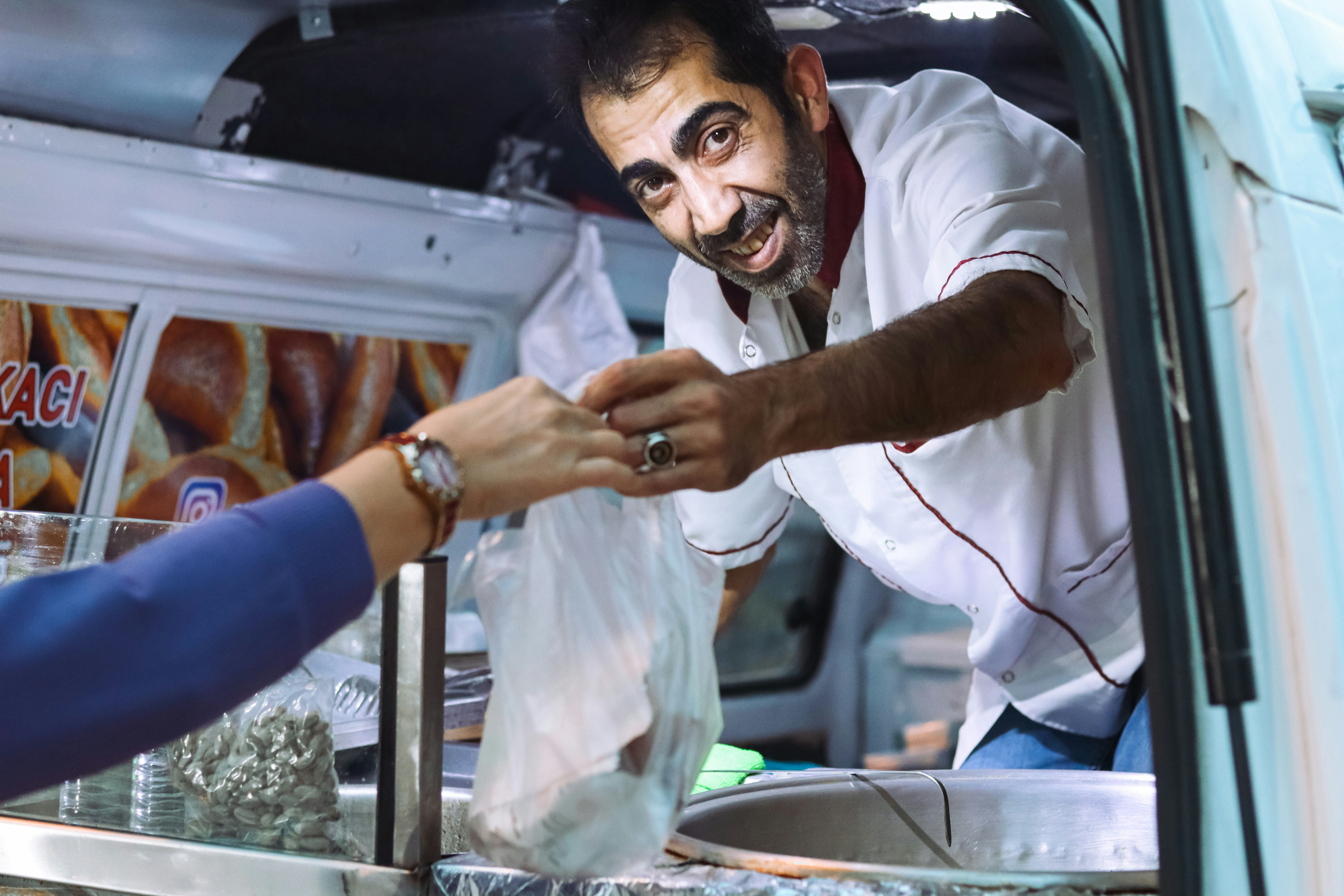 Food truck owner serving customers — illustrating New York LLC Operating Agreement.