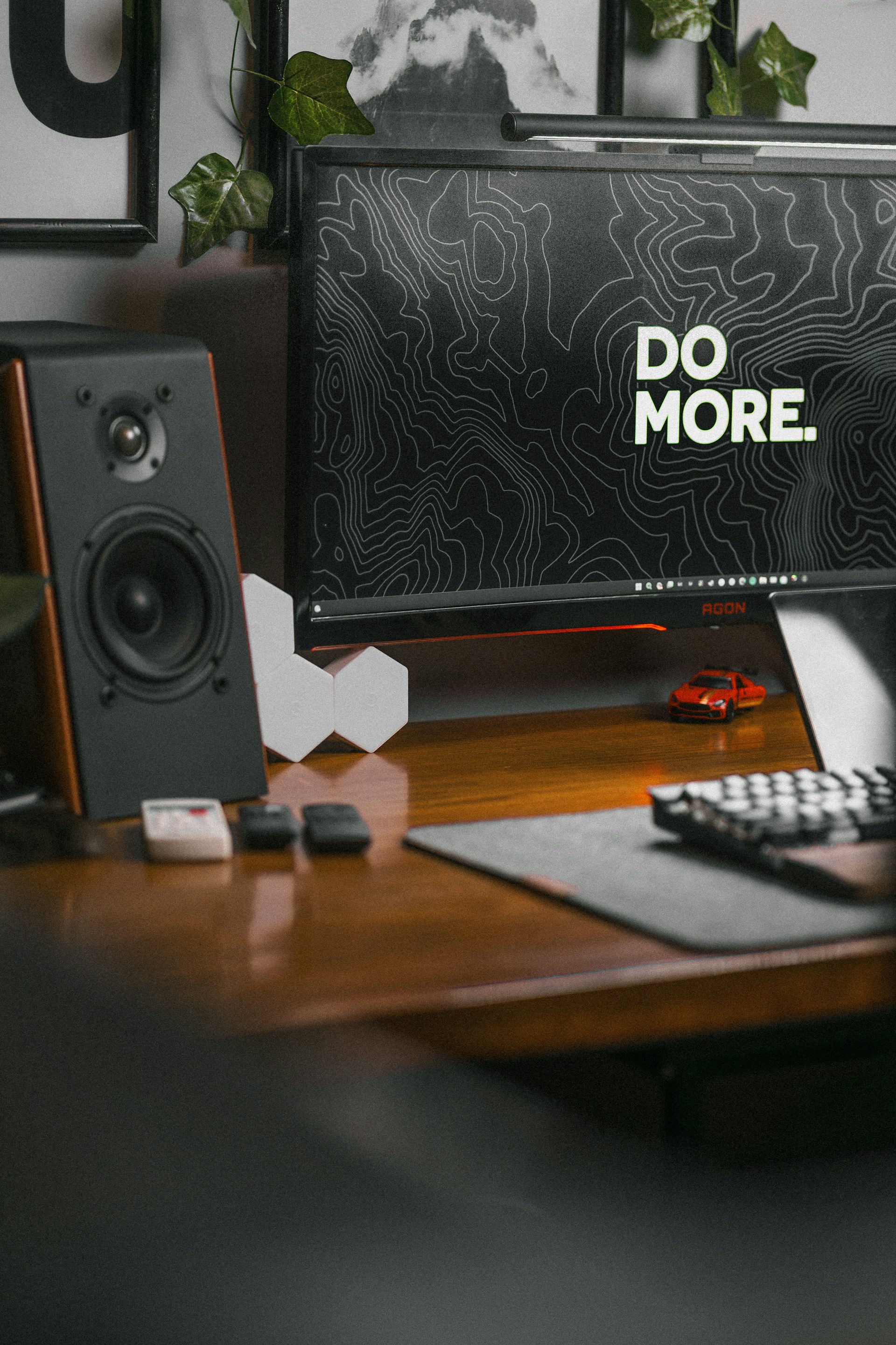 a desktop computer sitting on top of a wooden desk