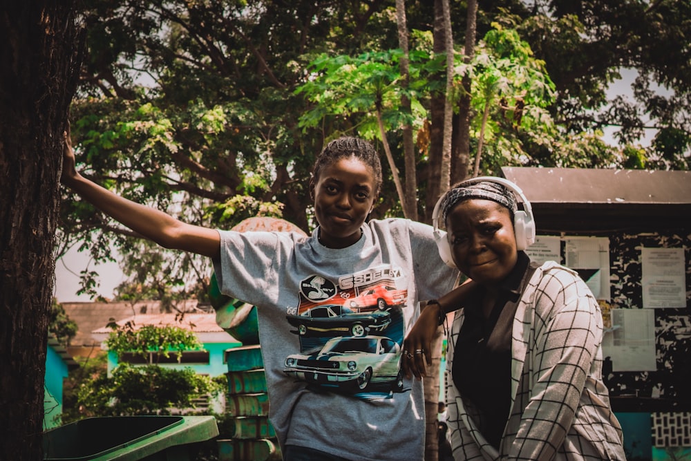 a couple of women standing next to each other