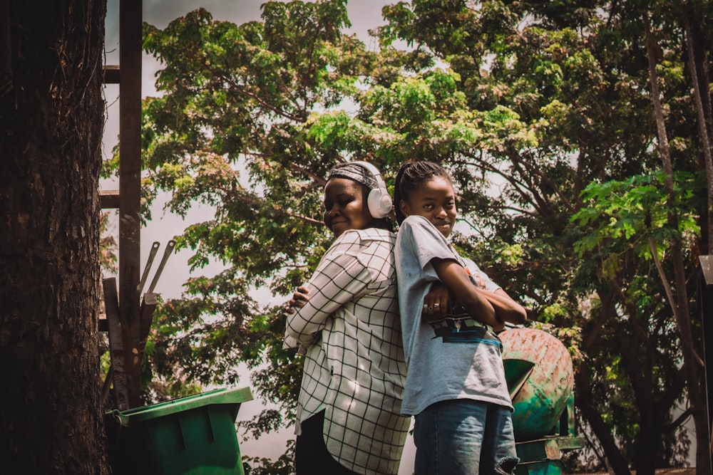 a couple of women standing next to each other