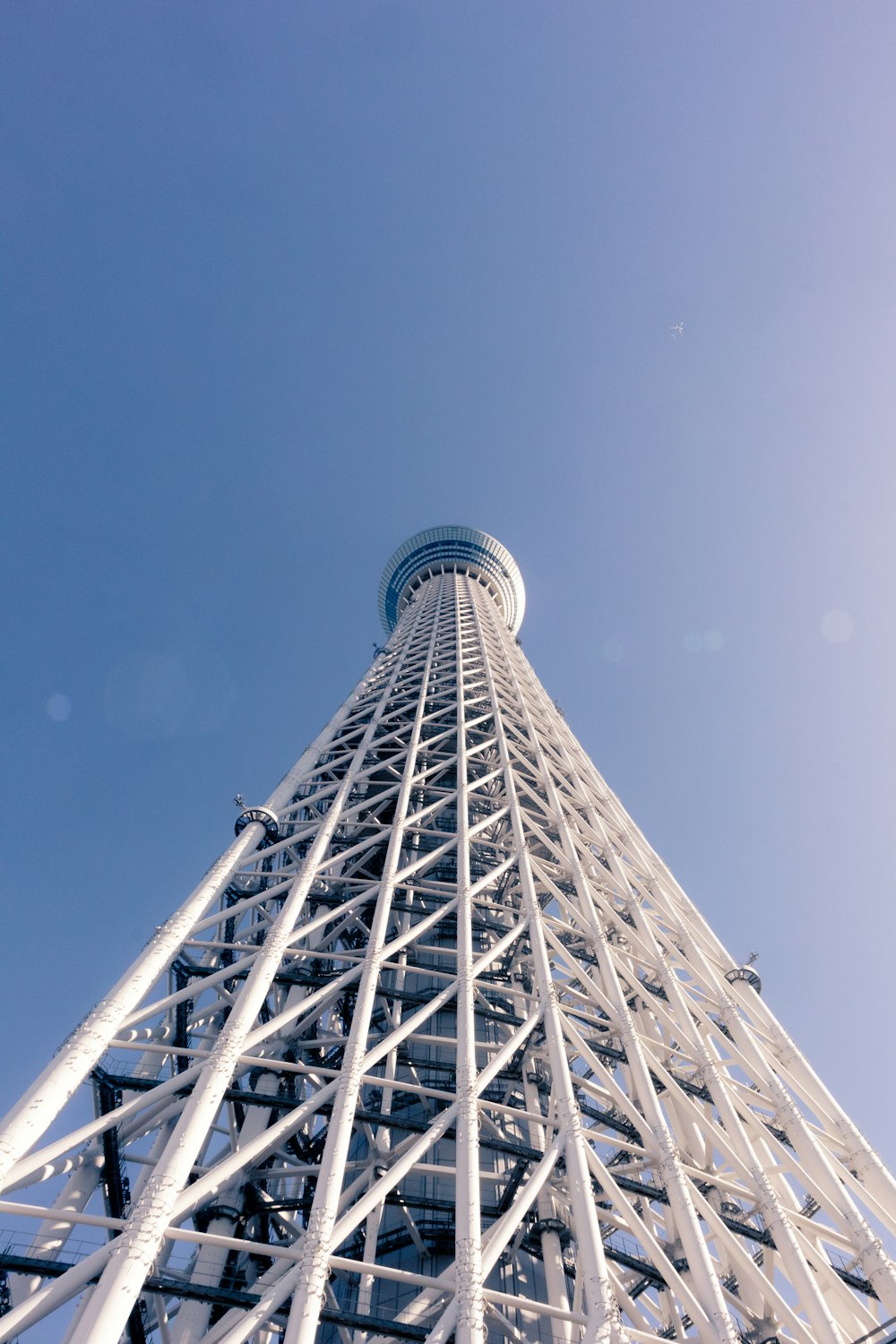 a tall metal structure with a sky background