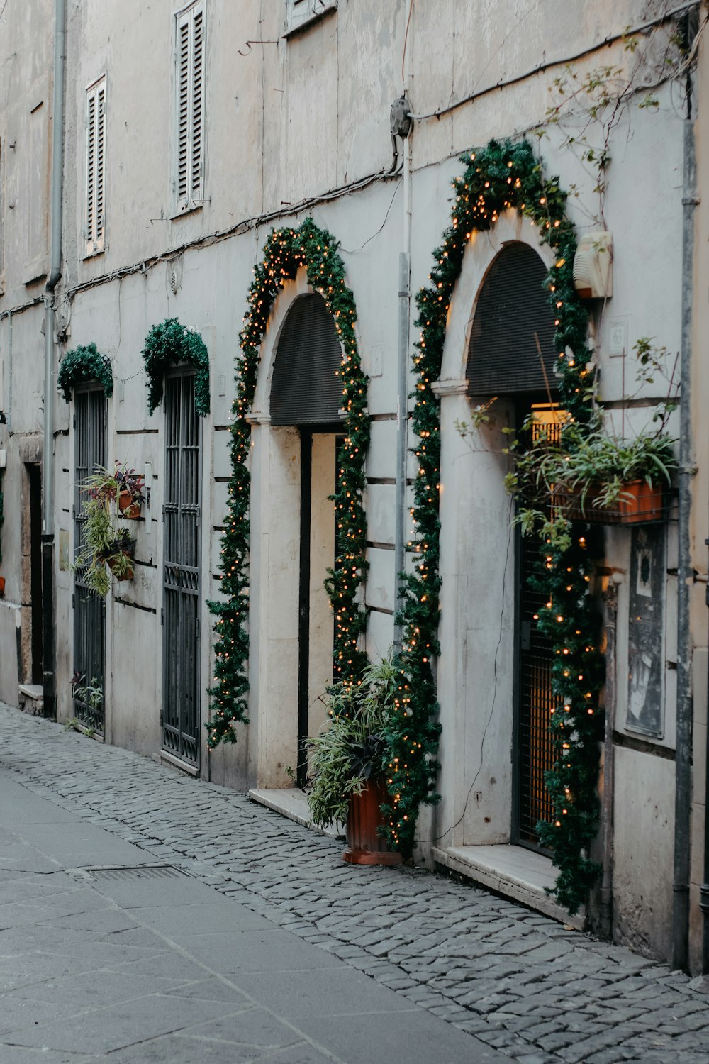 a couple of buildings that have christmas decorations on them