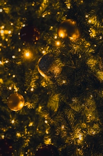 Close-up of a beautifully decorated Christmas tree with twinkling lights and ornaments.