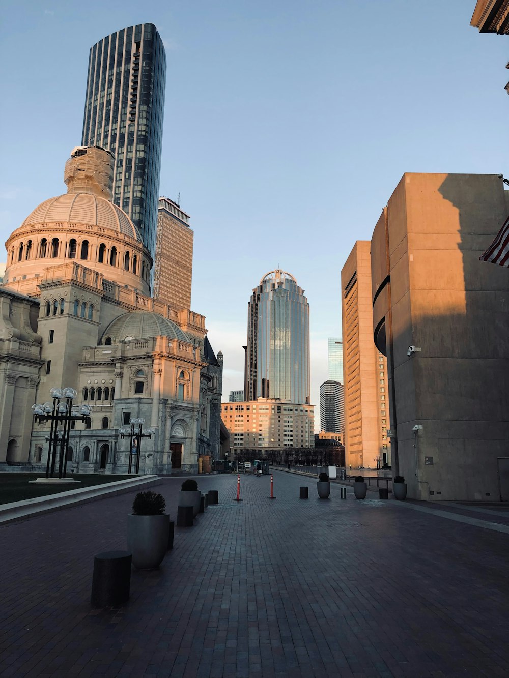 a view of a city street with buildings in the background