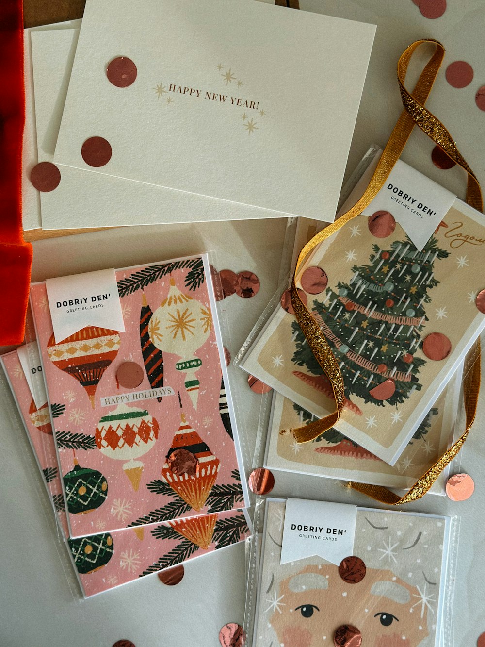 a table topped with lots of cards and envelopes