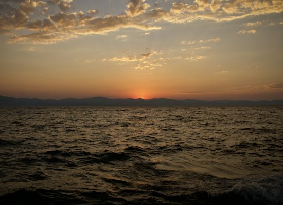 The sun is setting over a body of water — Lake Tahoe, United States