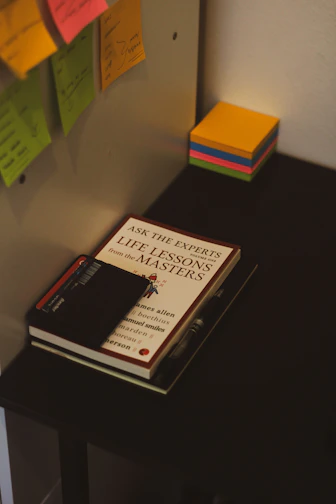 A neat office desk setup featuring essential supplies like pens, notepads, and organizers.
