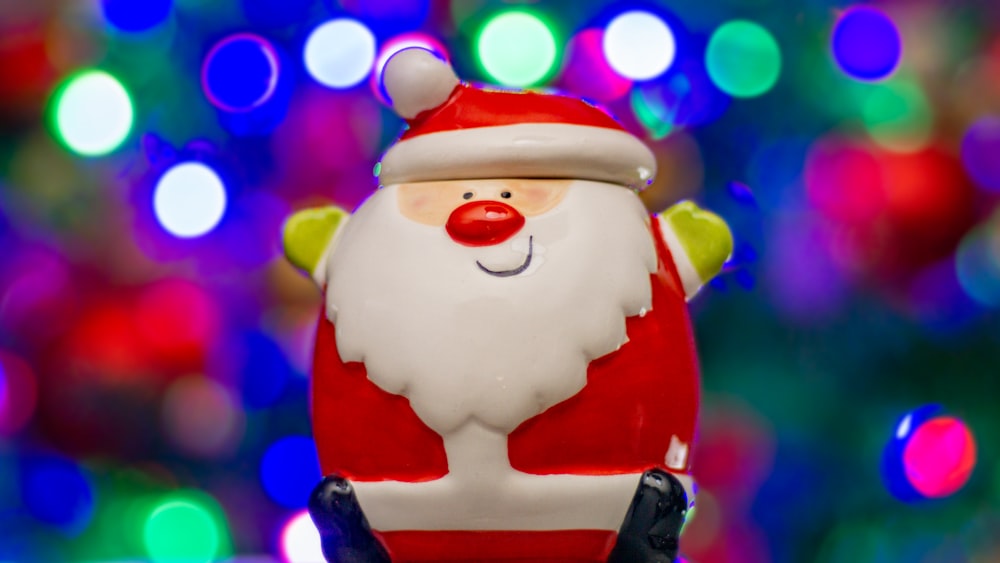 a close up of a santa clause ornament