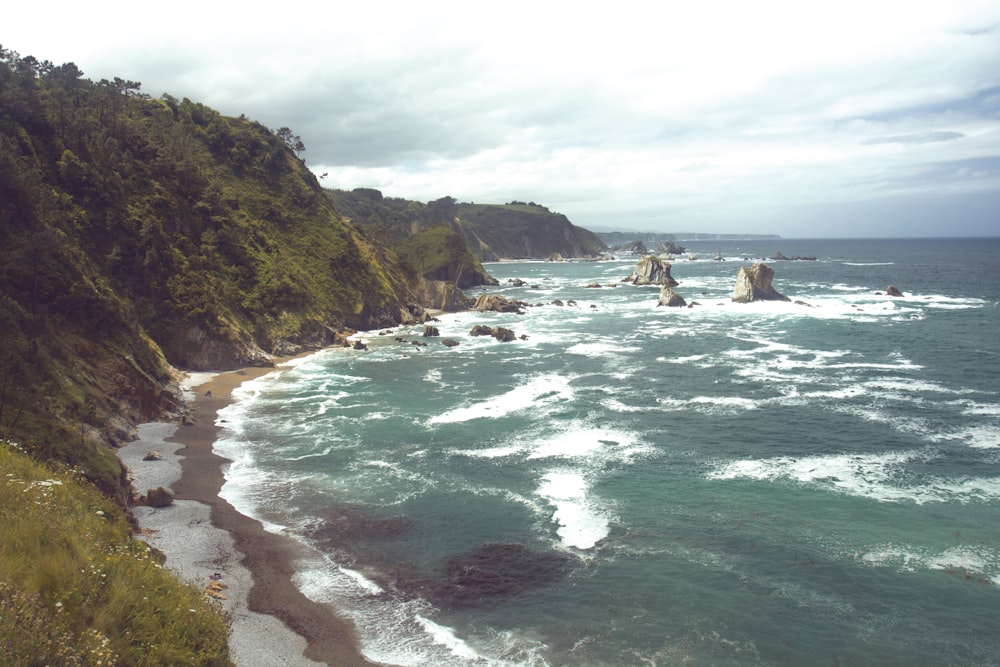 a view of the ocean from a cliff