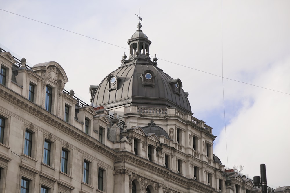 a large building with a clock on the top of it