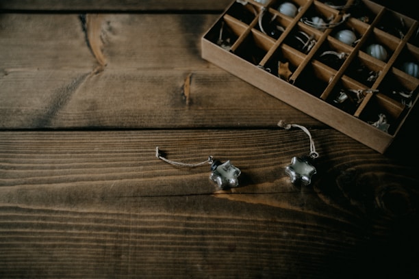A variety of open box items displayed on a wooden table.