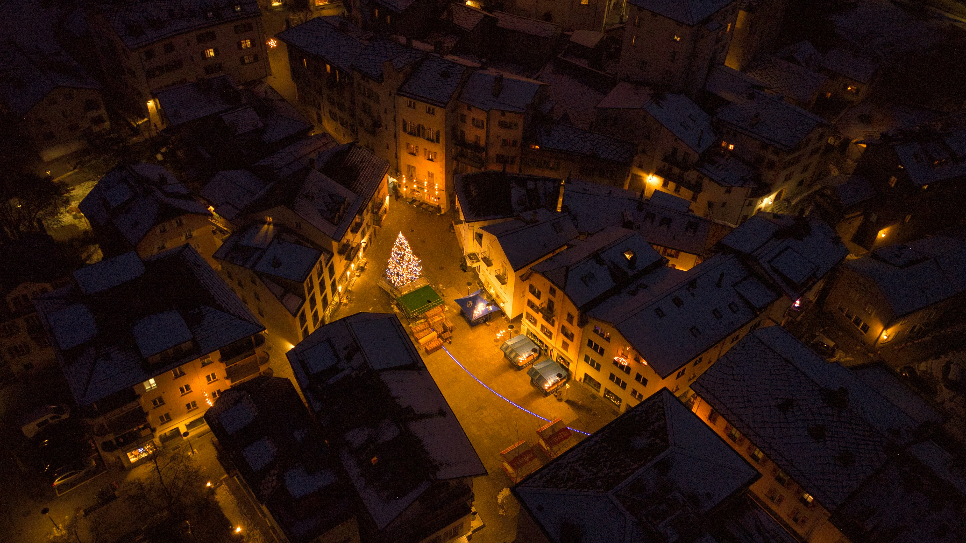 an aerial view of a city at night