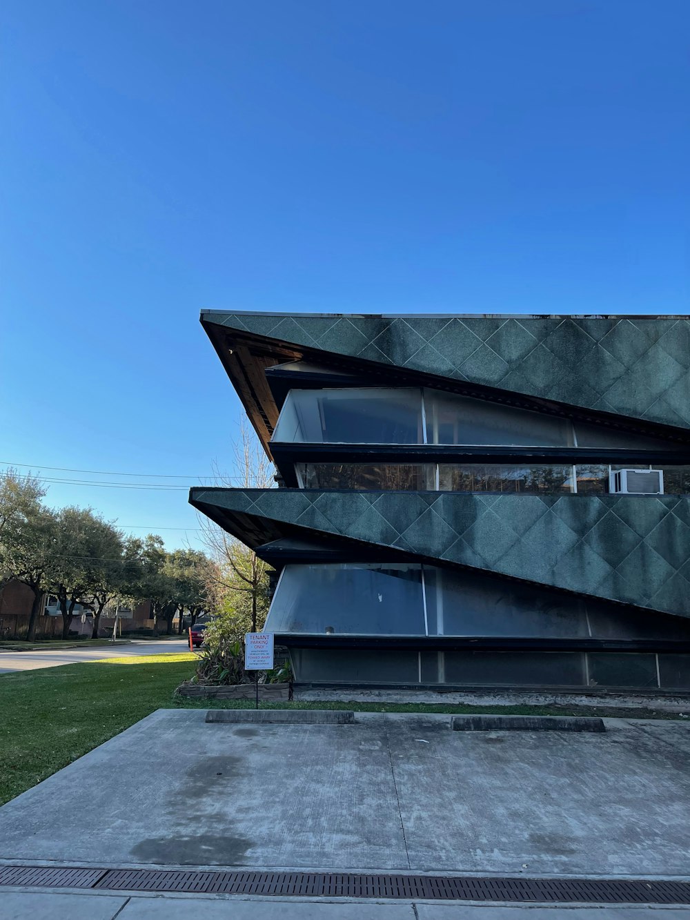 a modern building with a triangular roof