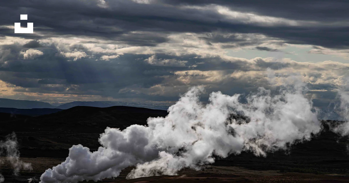 A large group of steam rises from the ground photo – Free Grey Image on ...