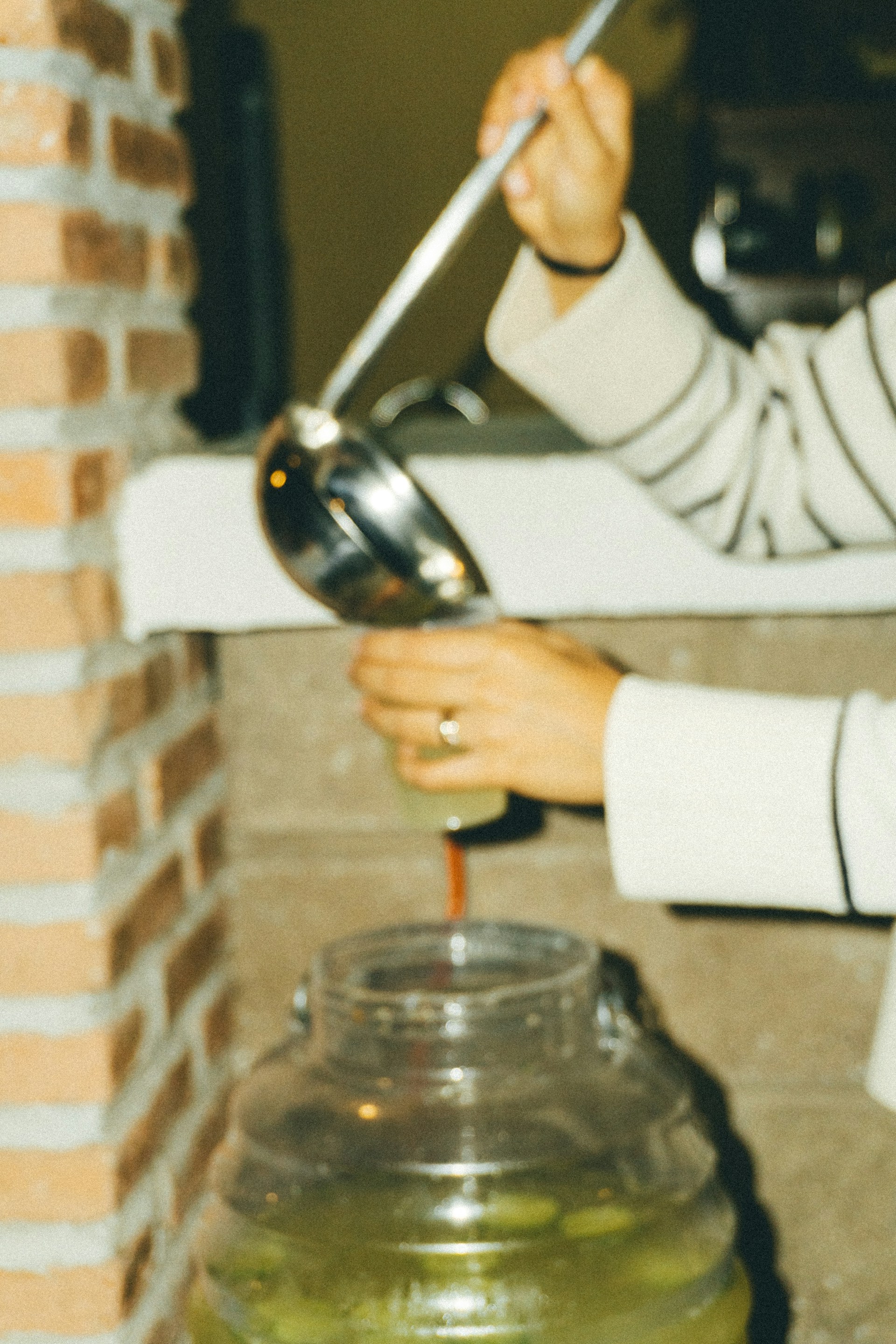 woman wearing yellow long-sleeved dress under white clouds and blue sky during daytime