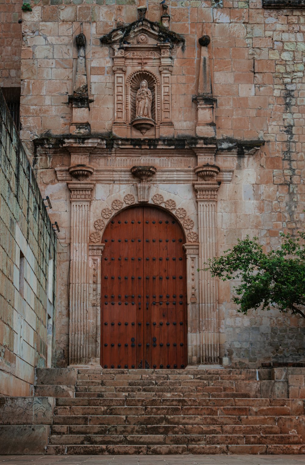 an old building with a large wooden door