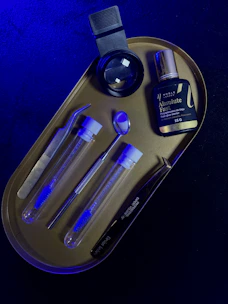 Basic dental exploration tools laid out on a sleek tray.