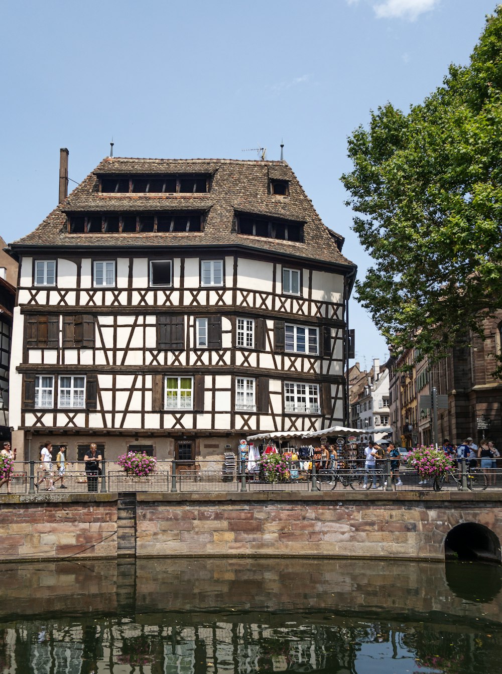 a building with a bridge over a body of water