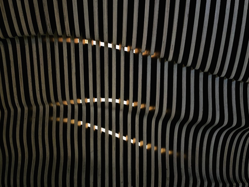 a close up of a metal structure with lights