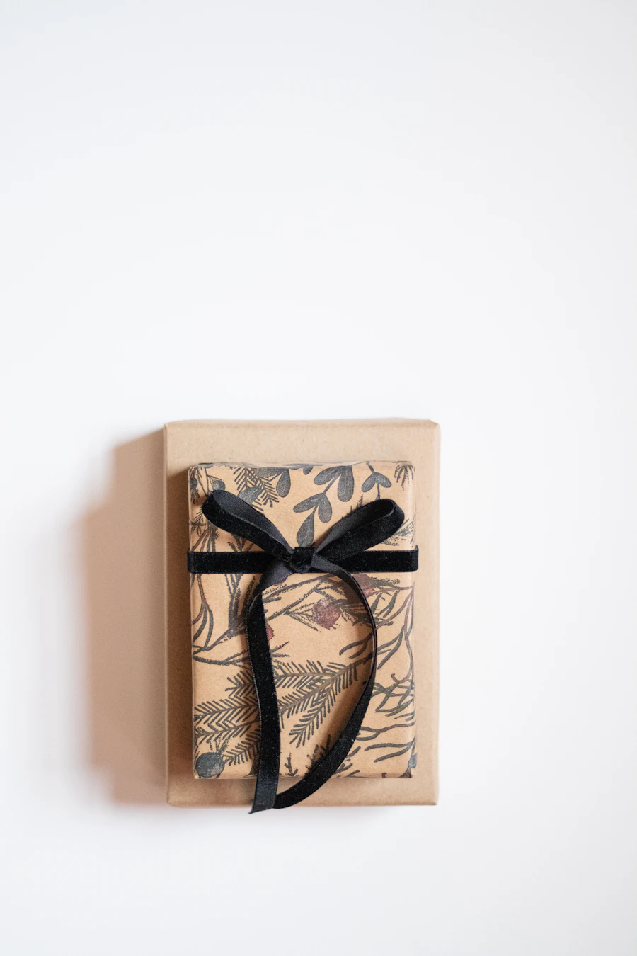 Signature gift hamper wrapped with ribbon