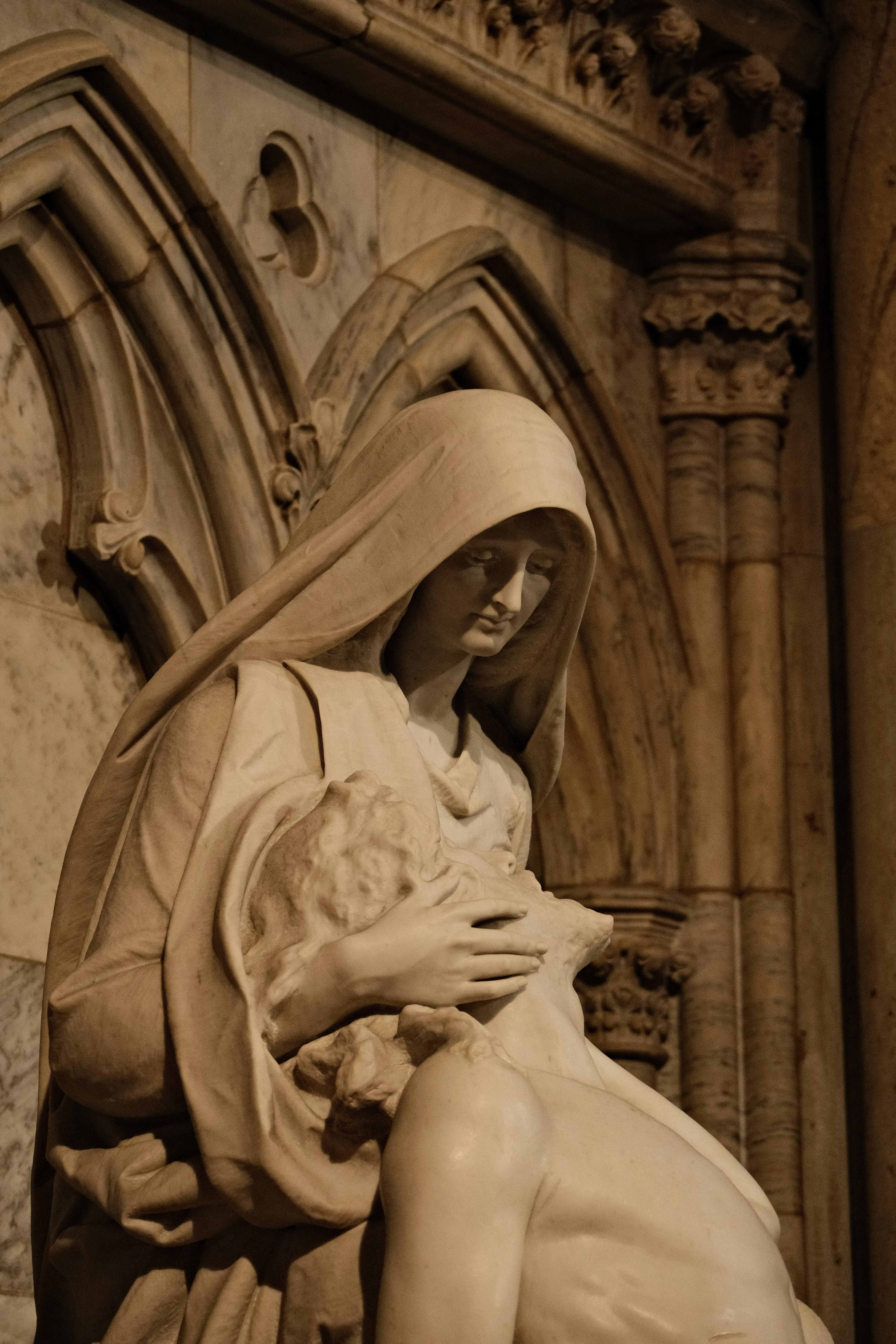 a statue of a woman holding a baby