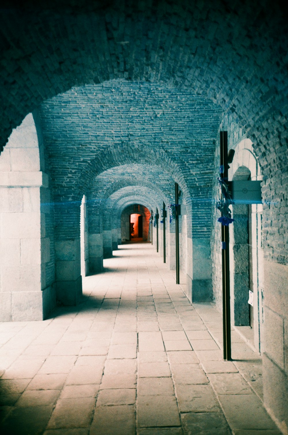 a long tunnel with a light at the end of it