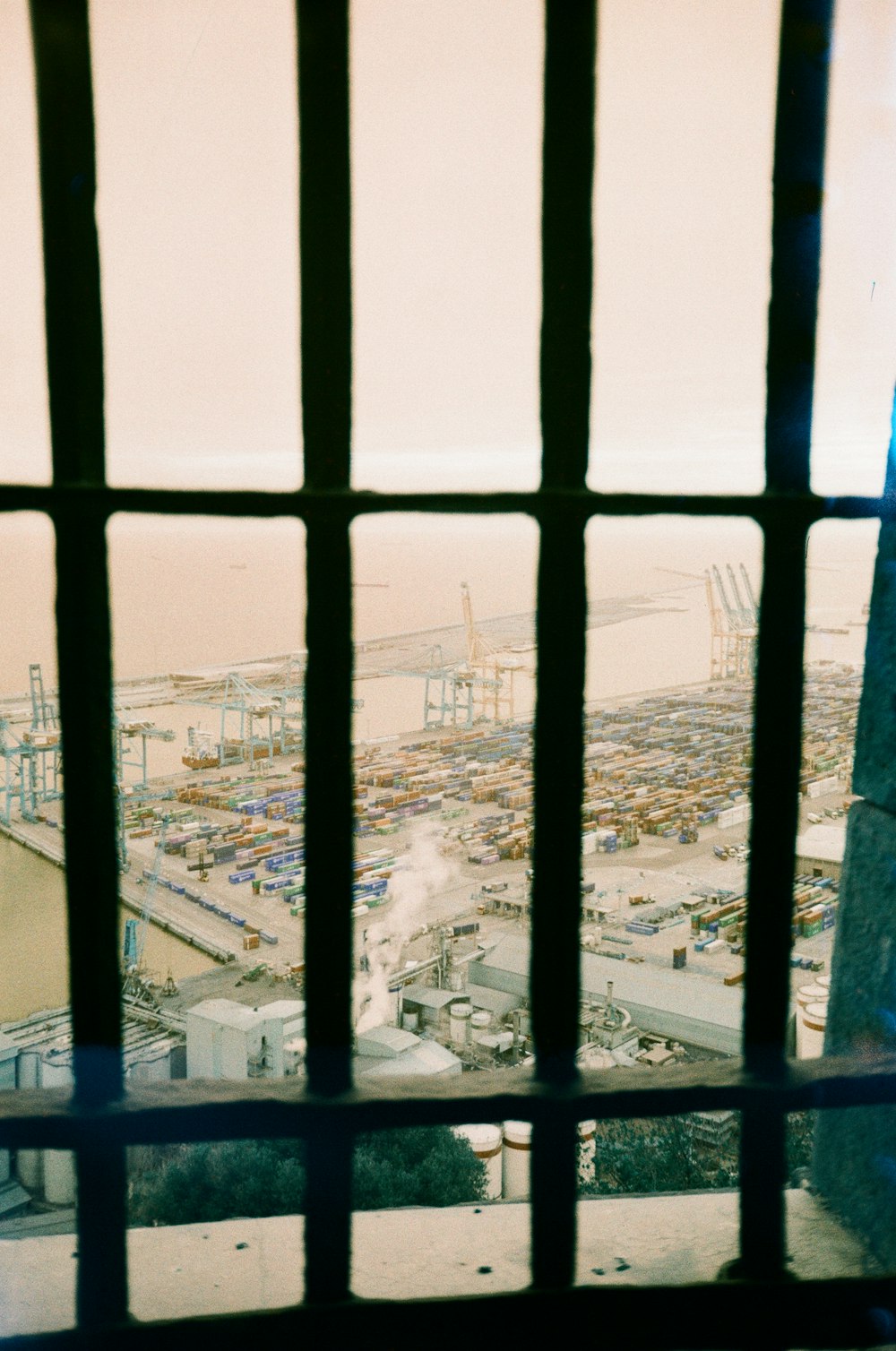 a view of a large industrial area through a window