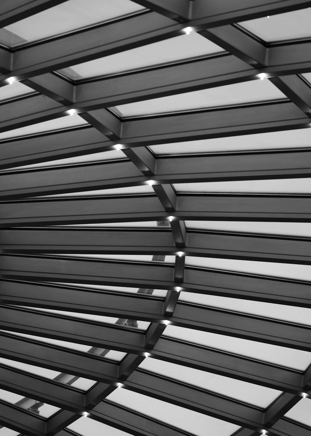 a black and white photo of a metal structure