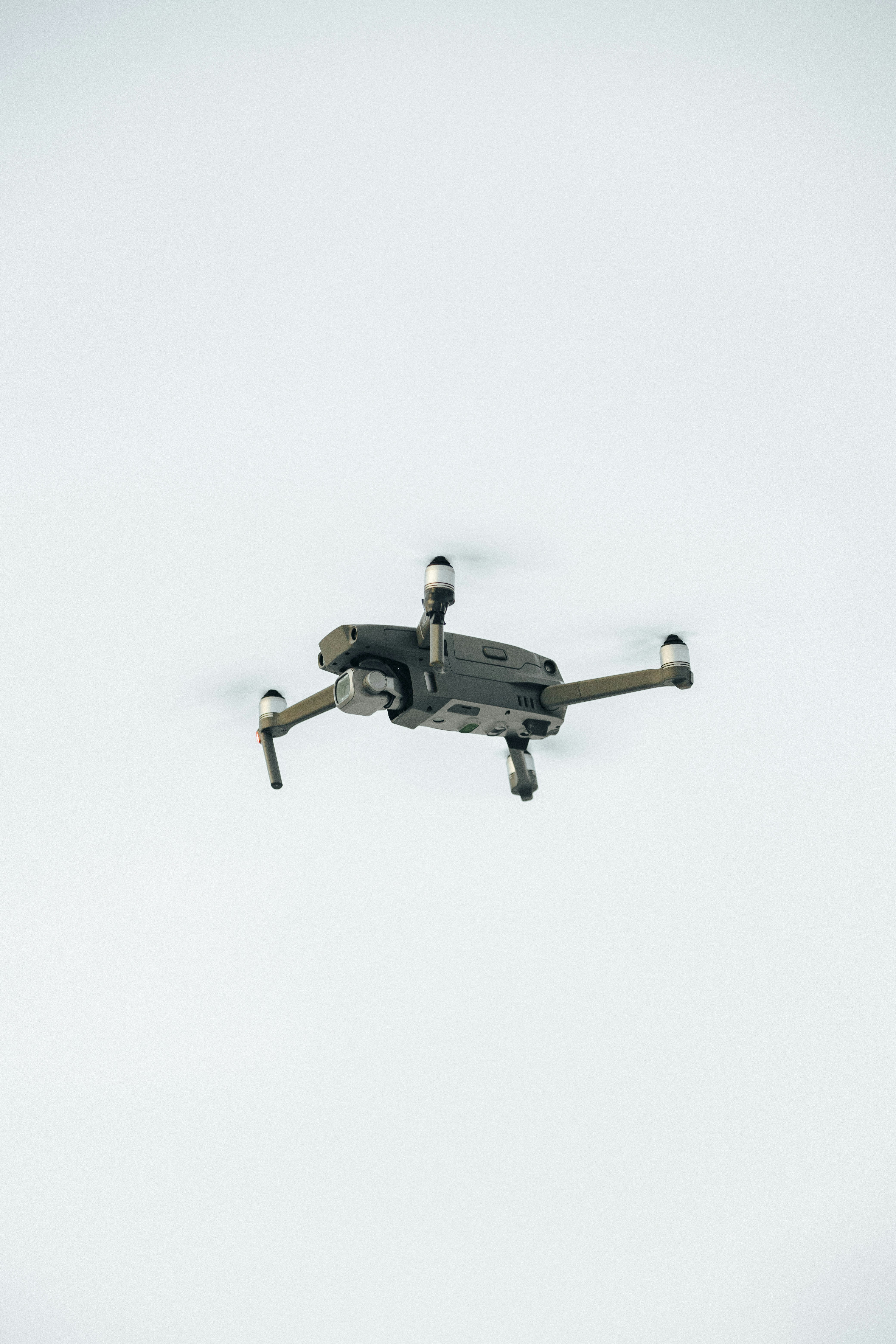 a black and white photo of a flying object