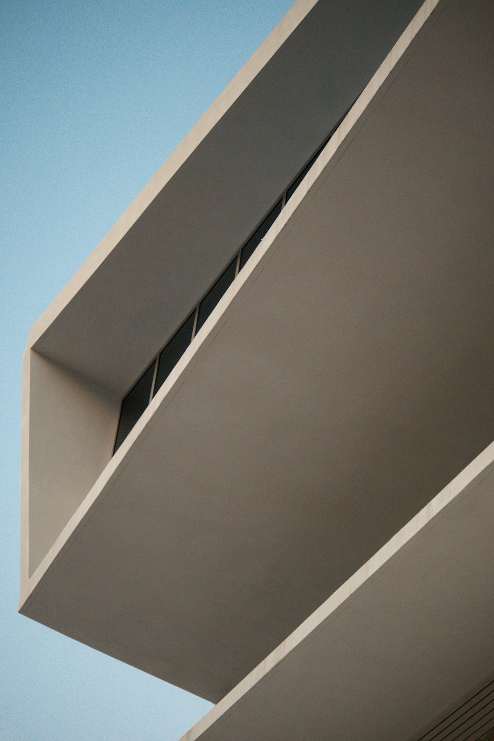 a close up of a building with a sky background