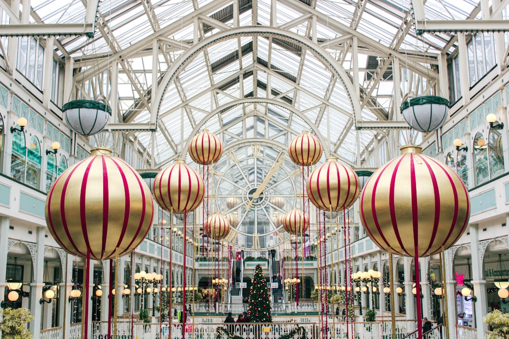 a mall filled with lots of christmas decorations