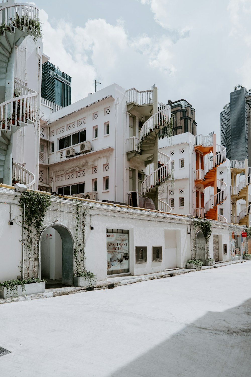 a white building with many balconies on top of it