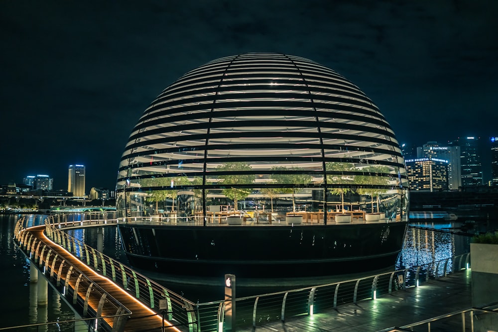 a large dome structure with a walkway leading up to it