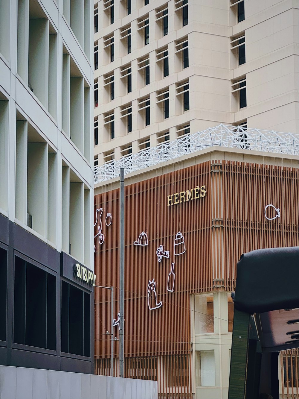 a tall building with a sign on the side of it