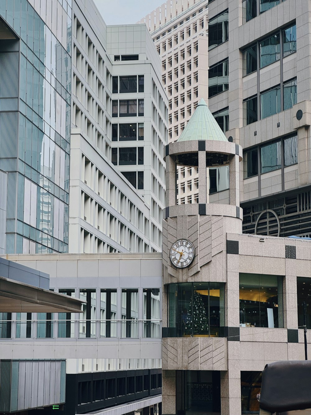 a clock tower in the middle of a city