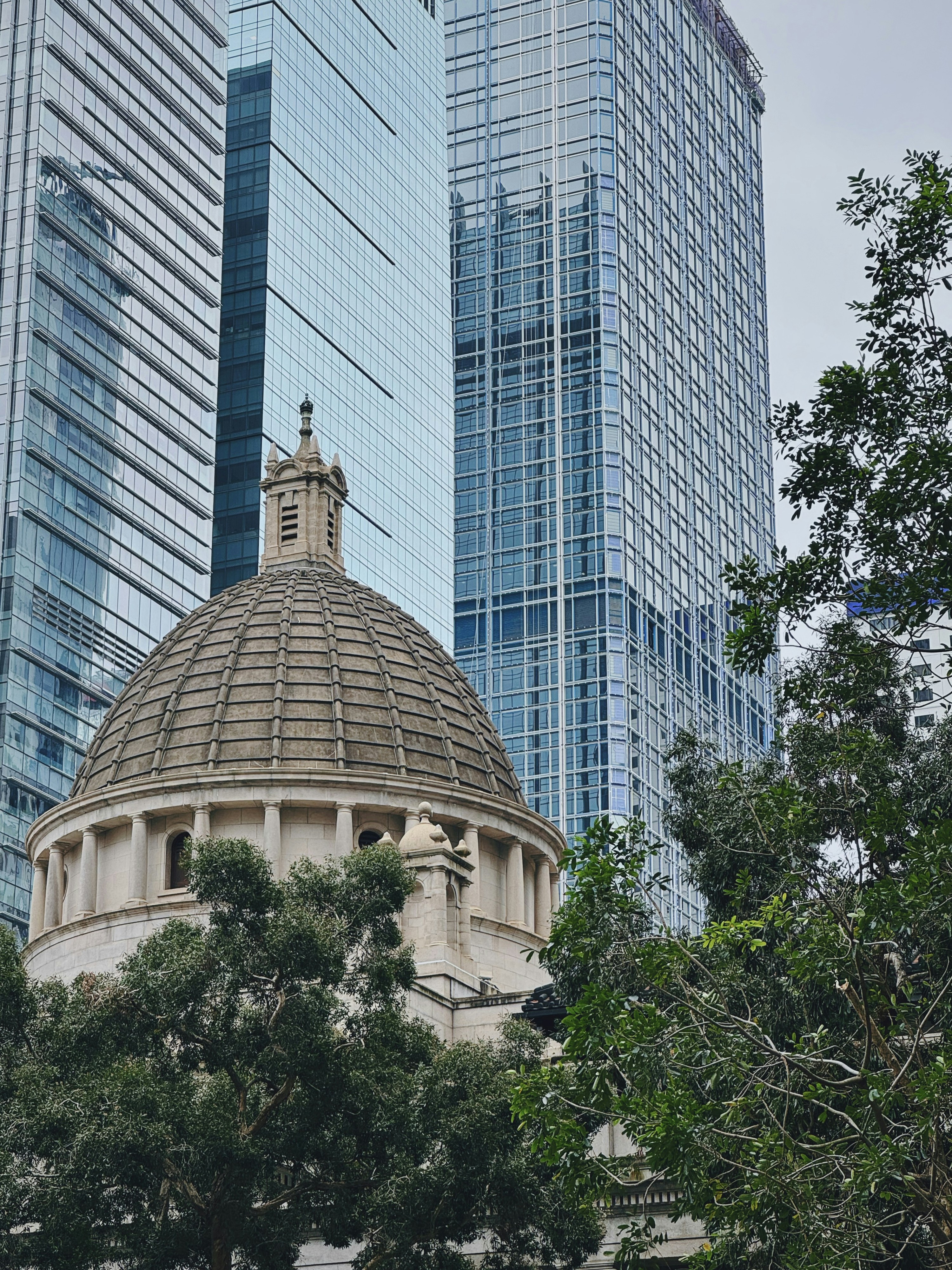 a large dome with a clock on top of a building