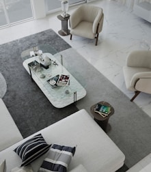 Sleek coffee tables in minimalist design arranged in a bright, airy living room with Persian luxury touches.